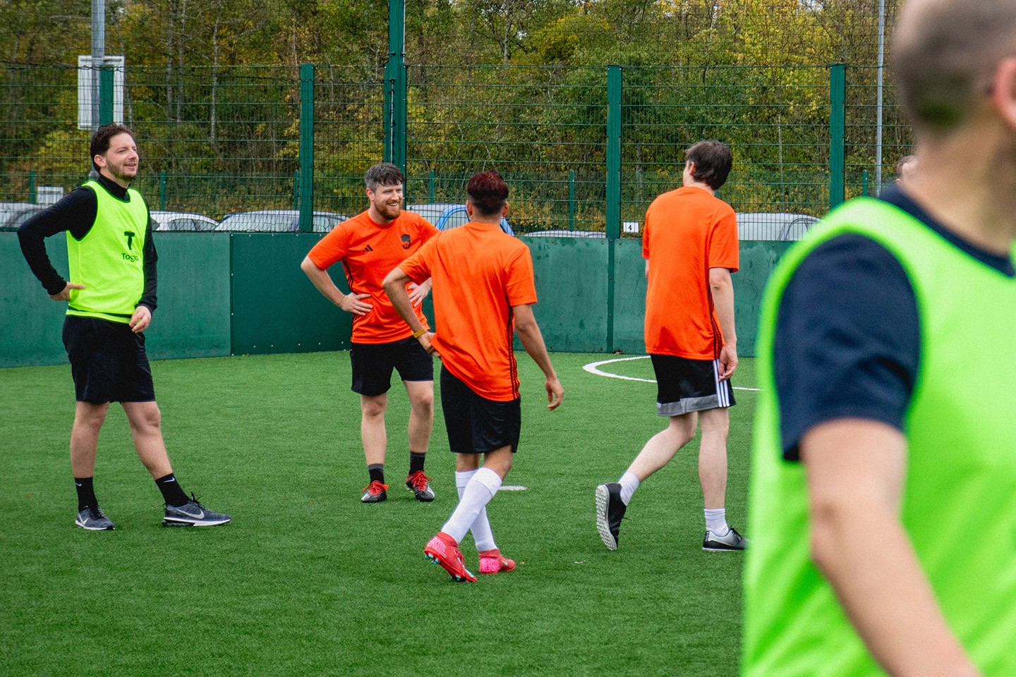 Photograph from Cup North 25. Players on the pitch in varying degrees of tired.
