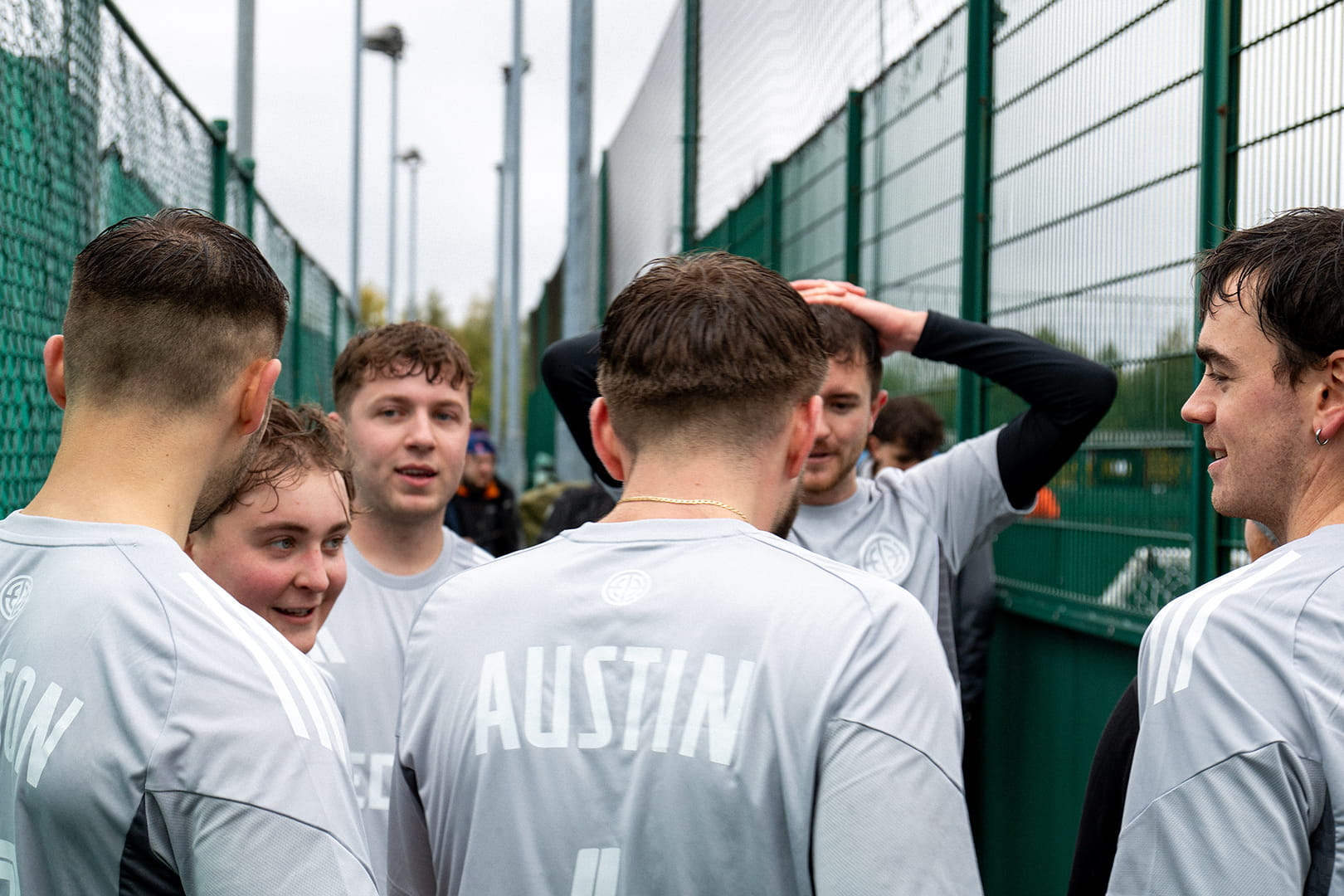 Photograph from Cup North 25. Team EDIT Studio are in a team huddle.